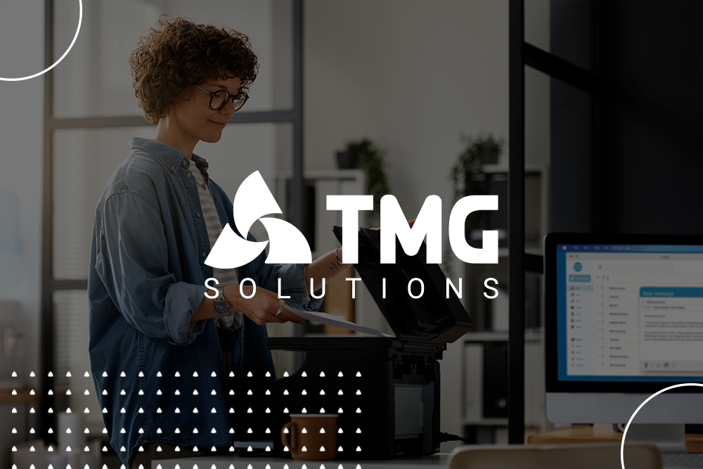 Equipe da TMG Solutions em ambiente de trabalho